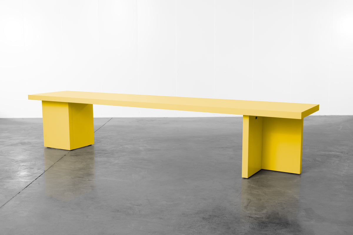 Bright banana yellow wooden bench by Bobbie Bahama