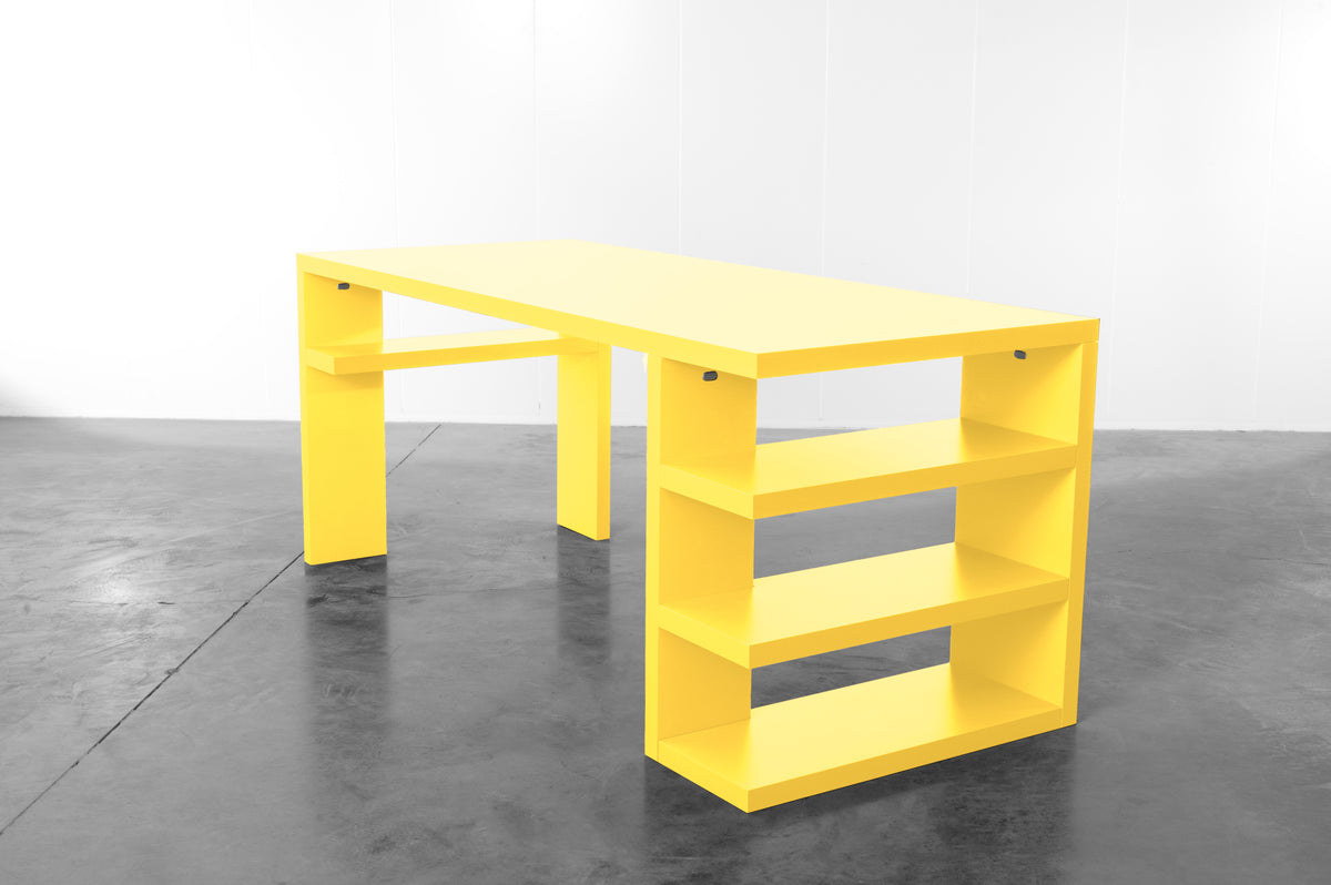 Bright yellow wooden desk by Bobbie Bahama