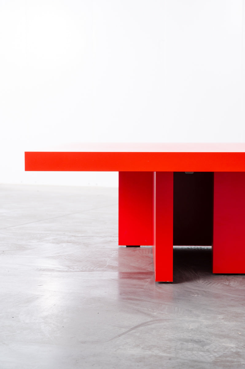 Bright red wooden coffee table by Bobbie Bahama
