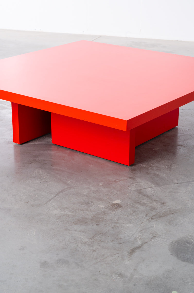 Bright red wooden coffee table by Bobbie Bahama