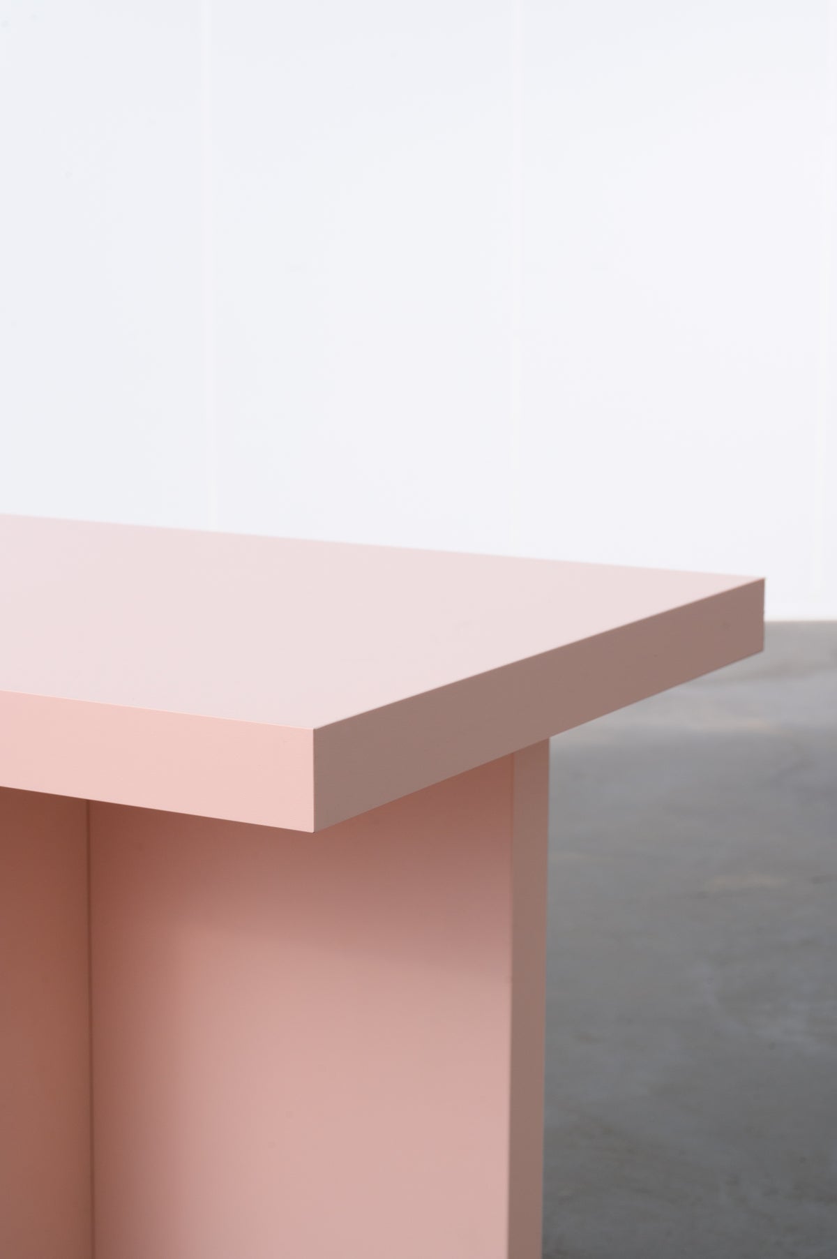 Pink wooden bench in sleek design, detail