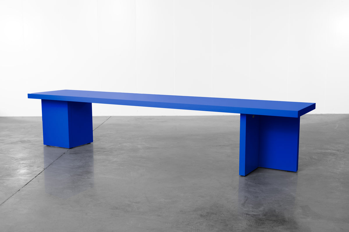 Cobalt blue wooden bench by Bobbie Bahama