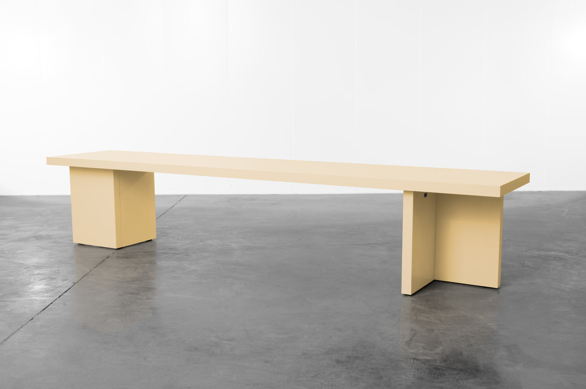 Butter yellow wooden bench by Bobbie Bahama