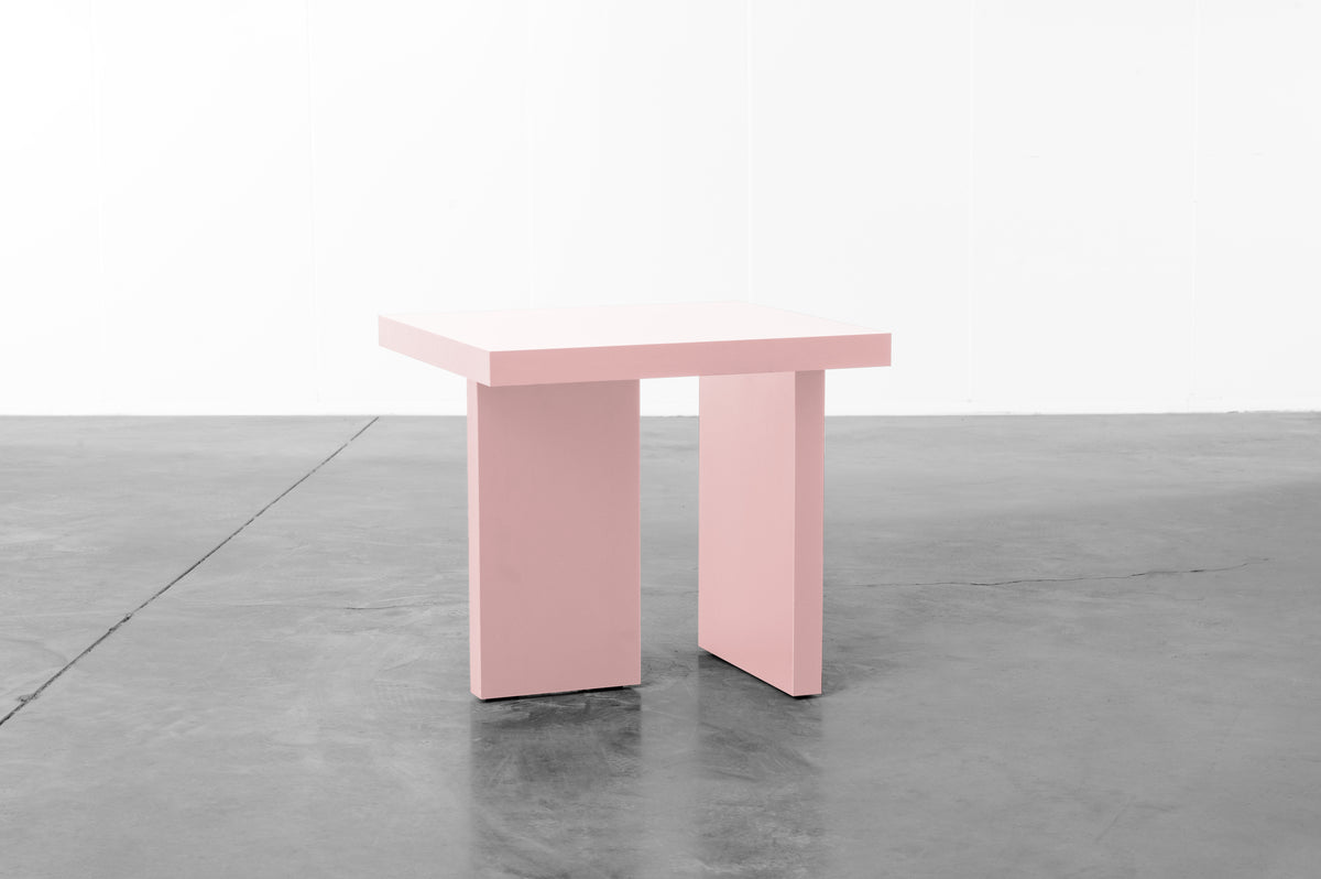 Baby pink wooden side table by Bobbie Bahama