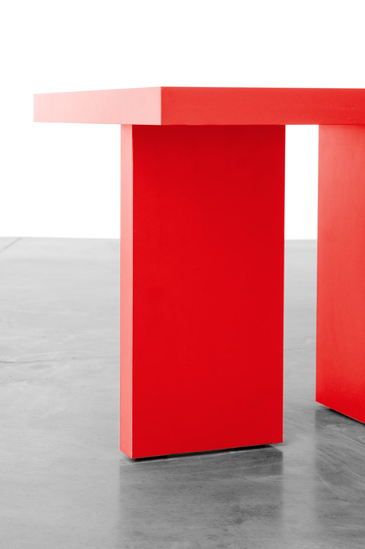 Bright red wooden side table by Bobbie Bahama