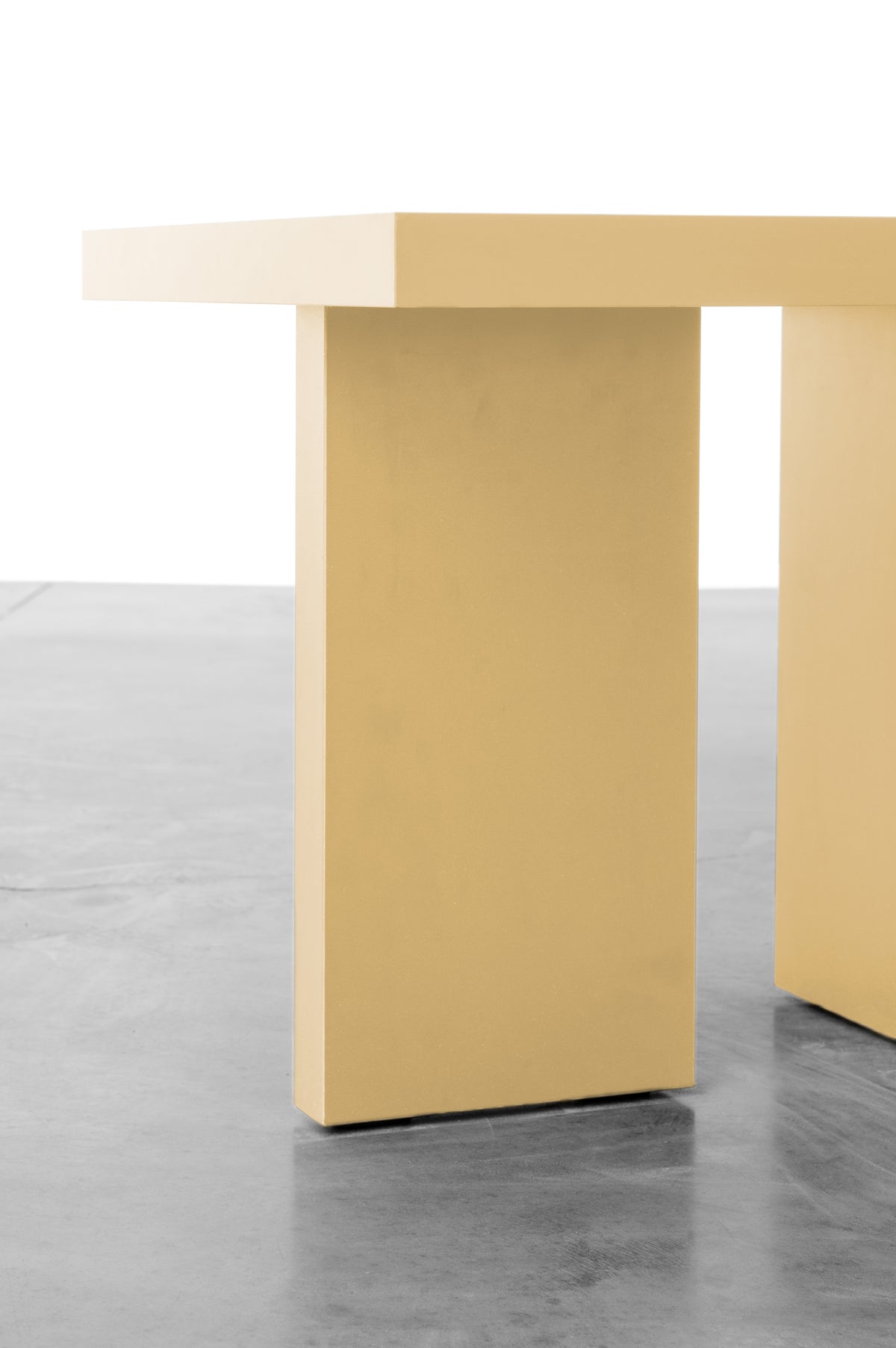 Butter yellow wooden side table by Bobbie Bahama