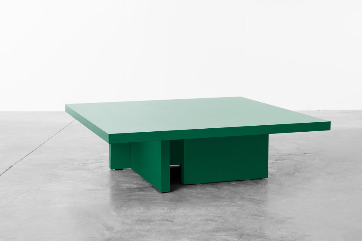 Forest green wooden coffee table by Bobbie Bahama