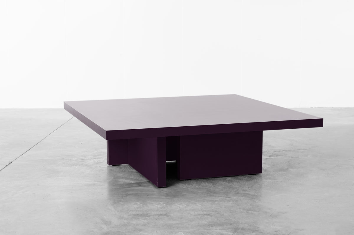 Plum wooden coffee table by Bobbie Bahama