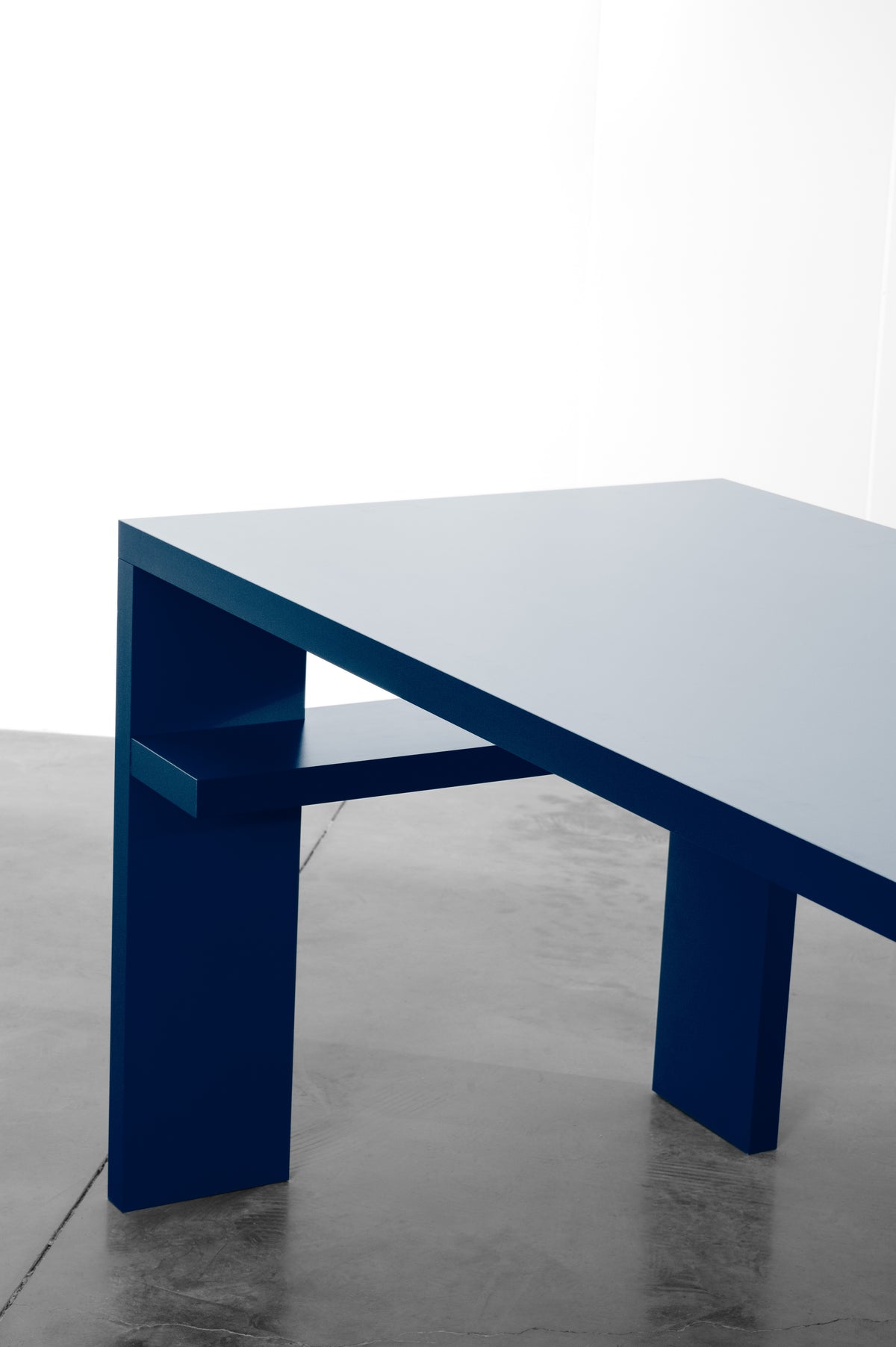Dark midnight blue wooden desk by Bobbie Bahama