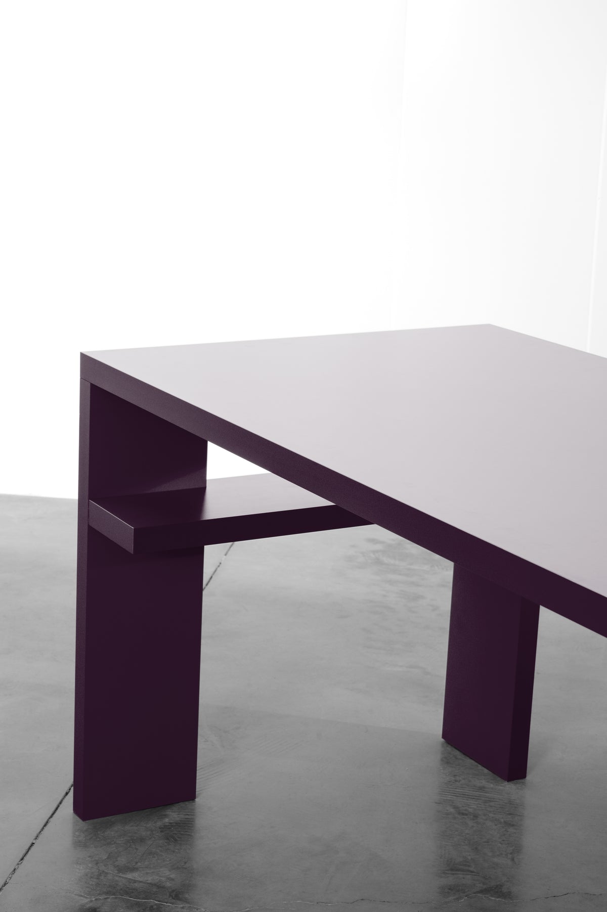 Deep purple wooden desk by Bobbie Bahama