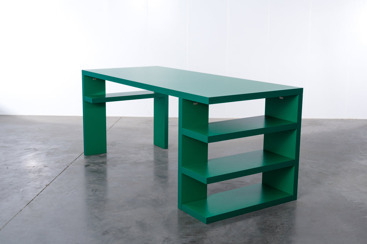 Deep green wooden desk by Bobbie Bahama