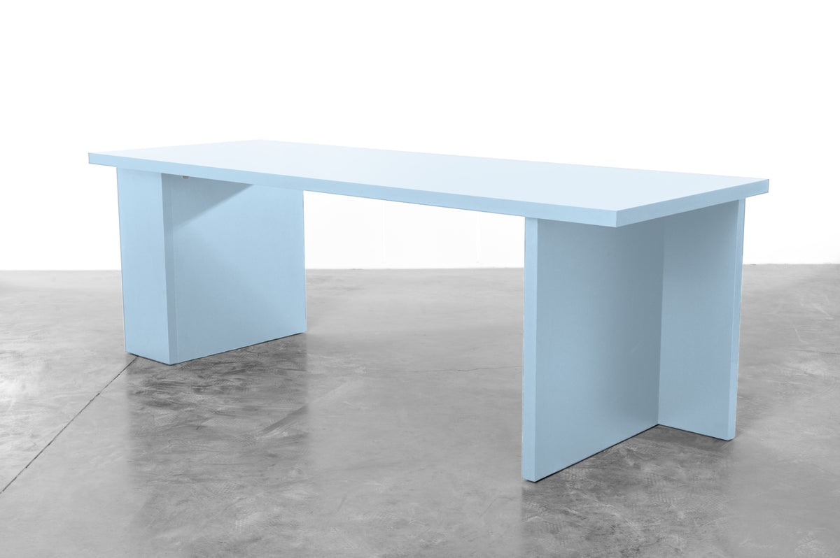 Large rectangular wooden dining table in baby blue designed by Bobbie Bahama