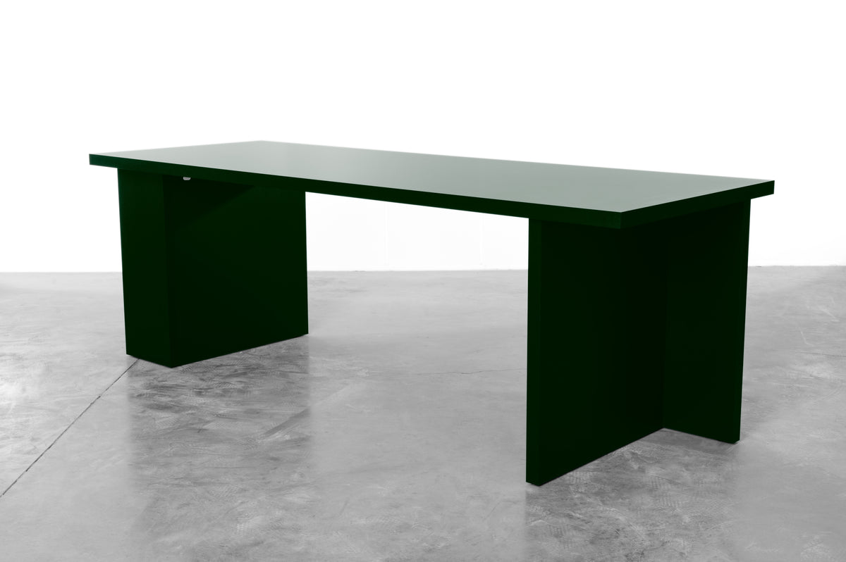 Large rectangular wooden dining table in black designed by Bobbie Bahama